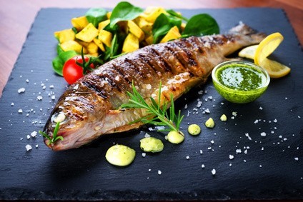 Grilled trout with potato and spinach